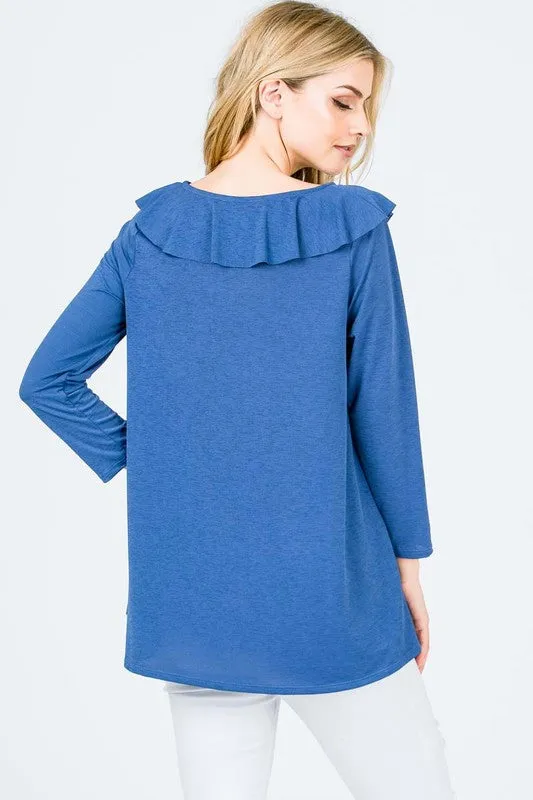 3/4 sleeve, v-neck top with ruffle panel & crisscross detail